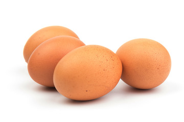 Brown chicken eggs, isolated on white background.