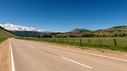 Altai landscape in summer with road and mountains, Russia