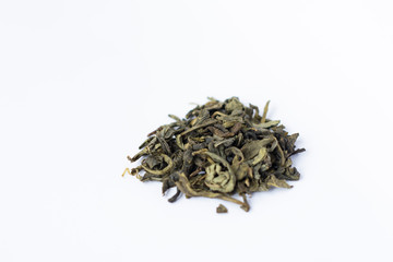 Fototapeta na wymiar Dry green tea on a white background