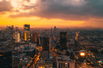 View from the drone of the streets and houses of the metropolis in Mexico City