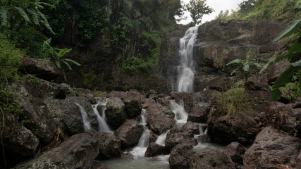 Cliffs with soft waterfalls in the hills