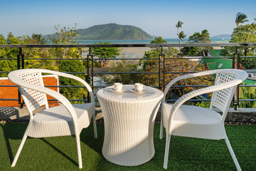 Outdoor seat on balcony with a view in pool villa, house, home, condo and apartment
