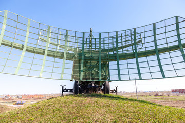 Old soviet military radar station against the blue sky