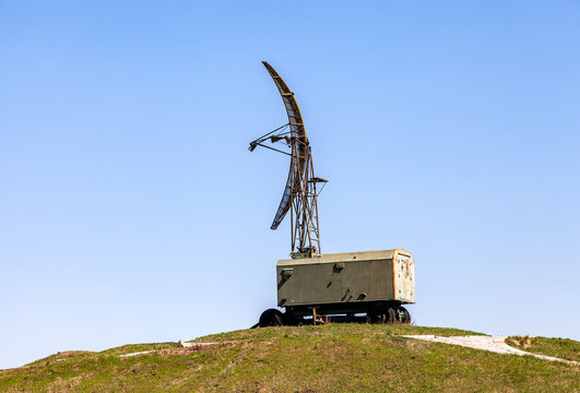 Old Soviet Military Radar Station Against The Blue Sky