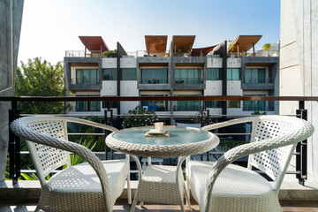 Outdoor seat on balcony with a view in pool villa, house, home, condo and apartment