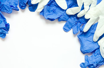 White and blue surgical gloves isolated on white background. Top view.  Copy space.- Image