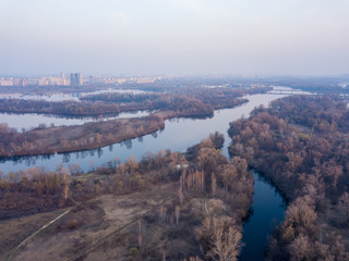 Landscape: blue hour over the Dnieper River in Kiev. Aerial drone view.