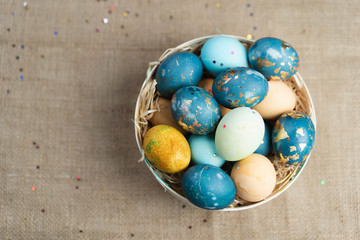 Easter basket with colored eggs, top frame, decor, poster, holiday, 2020