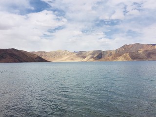 lake in the cradle of mountains.