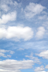 Naklejka na ściany i meble Soft white clouds in blue sky background