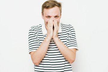 man laughs and covers her mouth