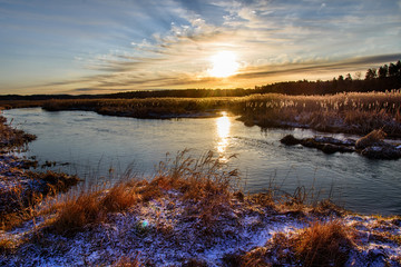 Sunrise river winte snow