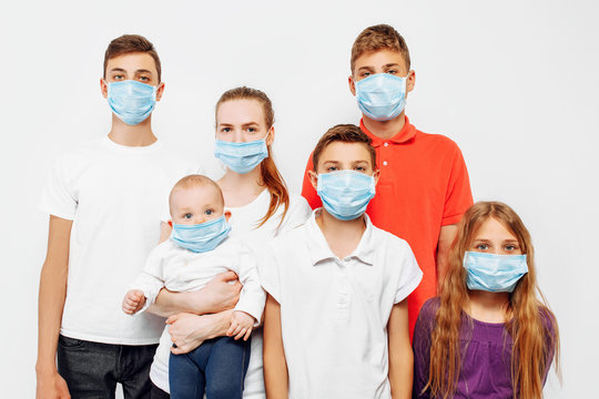 CAVID-19 pandemic coronavirus family, parents and children wear a protective mask to protect against viruses, coronavirus disease
