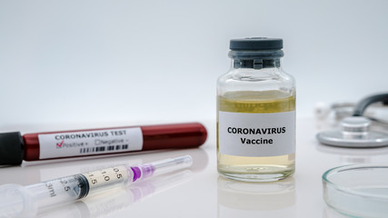 Coronavirus vaccination with sample blood testing Covid-19 and syringe injection