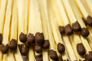 Wooden matches with gray closeup. Macro photography