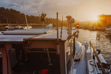 14.02.2020 Prague, Czech Republic: Sunset view on Prague old town, Vlatava river and iconic Charles bridge in cozy fog, Czech Republic