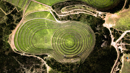 Aerial view of Moray Archeological site - Inca ruins of several terraced circular depressions, in...