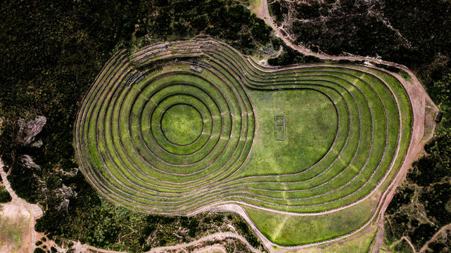 Aerial view of Moray Archeological site - Inca ruins of several terraced circular depressions, in Maras, Cusco province, Peru. Top tourist attraction in Sacred valley of the Incas. 