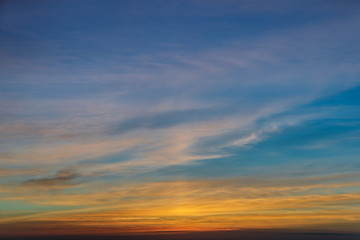 Obraz premium Sunrise clouds in the ocean.