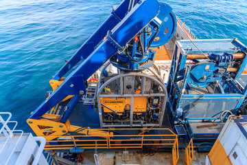 WICK, SCOTLAND - 2017 MARCH 23. Oceaneering Remote Operate Vehicles ROV Magnum on deck and secured on a offshore vessel.