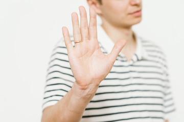 Businessman shows stop gesture