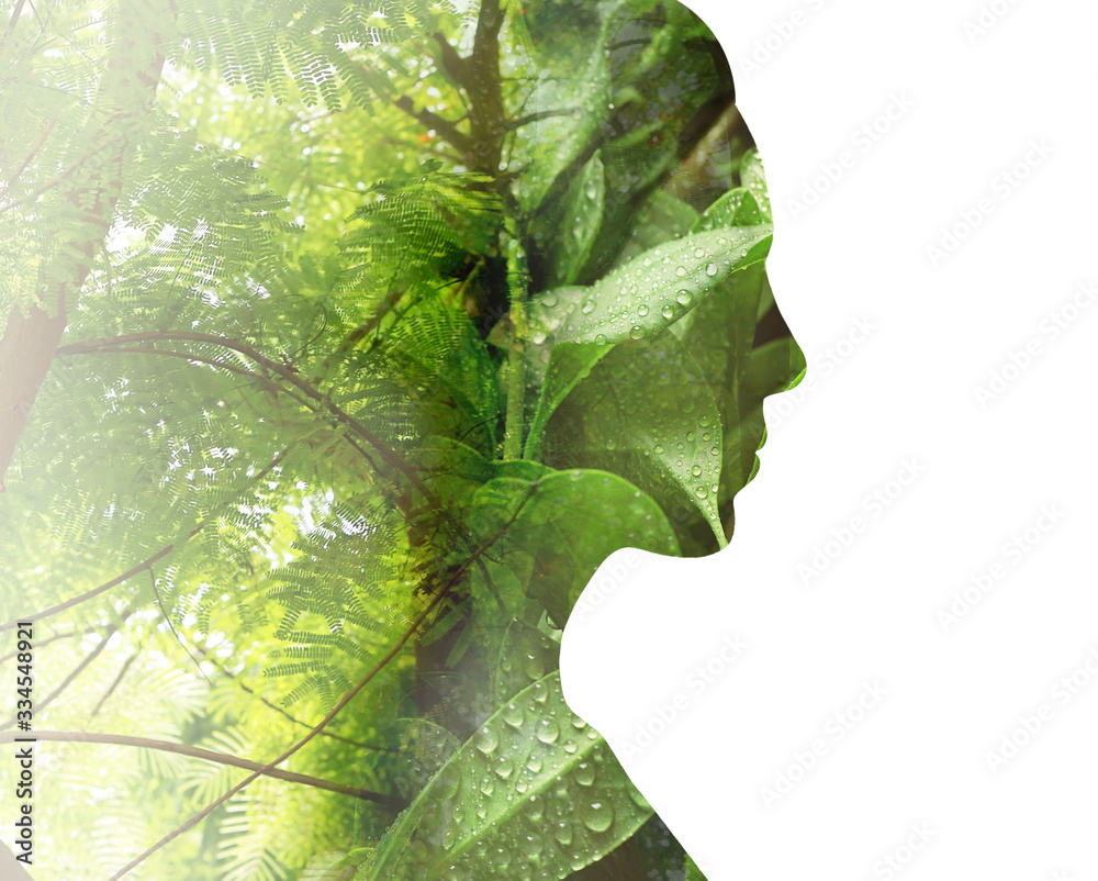 Wall mural woman and tropical plants on white background. double exposure