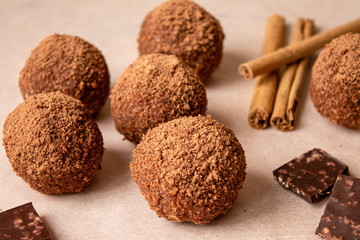 Baked potatoes for Breakfast prepared at home by hand with chocolate and sprinkled with cocoa