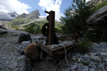 Old rusty funicalar winch on top of the mountain