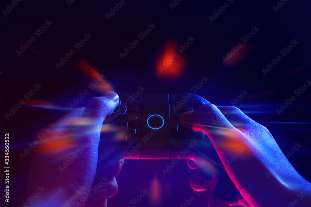 Canvas Prints gamer boy with hand holding the joystick controller electronic for playing game with online network 