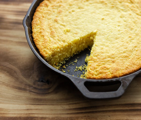 Homemade Southern style cornbread baked in a cast iron skillet. 