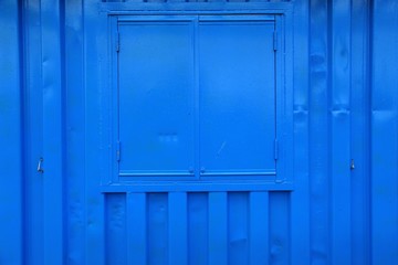 Blue Window Shutter and Wall