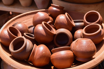 Fototapeta na wymiar clay pots for sale at the Aracaju handicraft market