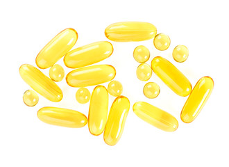 Different capsules Omega 3 on a white background, top view.