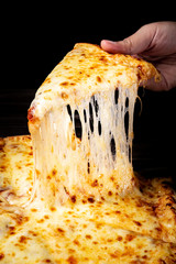 Stretched cheese pizza 