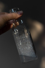 glass bottle with the soap foam