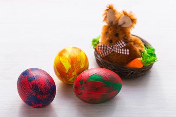 Holidays, traditions and Easter concept - Multi-colored decorative colourful eggs.