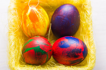 Holidays, traditions and Easter concept - Multi-colored decorative colourful eggs.