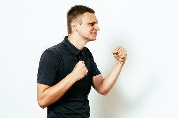 Confident businessman ready for fight.