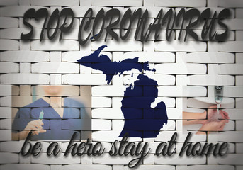 STOP CORONAVIRUS, Be a hero stay at home, the State of Michigan map, doctor holding an injection in hand, the person washes his hands, blurred image.