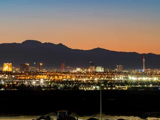 Foto op Canvas Dusk high angle view of the skyline of Las Vegas with Excavator below © Kit Leong