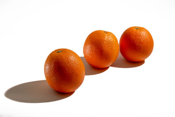 Oranges are on the table.