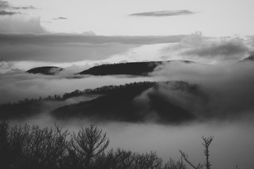Fototapeta premium Rolling fog over mountains