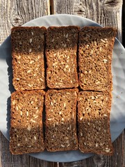 Delicious bread with seeds and spices macro