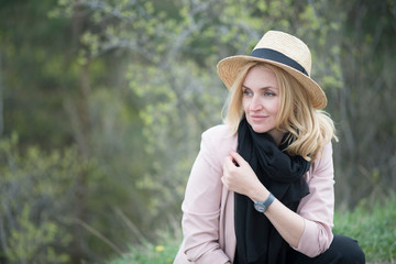 young woman in a straw hat