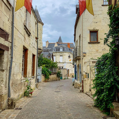 Fototapeta na wymiar Empty cobblestone street in Tours, France
