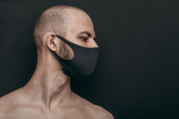 portrait of a man in black mask