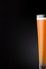 Glass of cold grapefruit beer