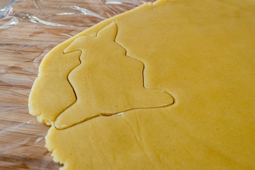 Cut out Easter bunnies from fresh short pastry