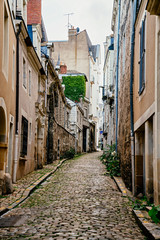 Fototapeta na wymiar Empty street in city of Angers, France in the Loire Valley