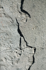 Crack in the concrete wall. Old cement building.